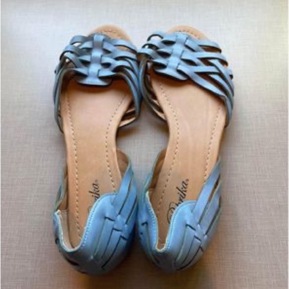 Blue slip on shoes.